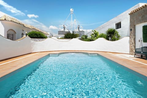 Property building, Living room, Swimming pool