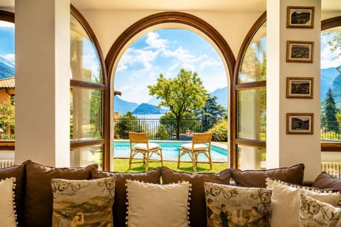 Patio, Nearby landmark, Day, Natural landscape, Living room, Seating area, Lake view, Mountain view, Pool view, Swimming pool, sunbed