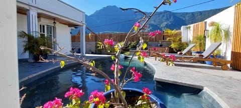 Property building, Patio, Day, Natural landscape, Garden, Garden view, Mountain view, Pool view, Swimming pool, sunbed