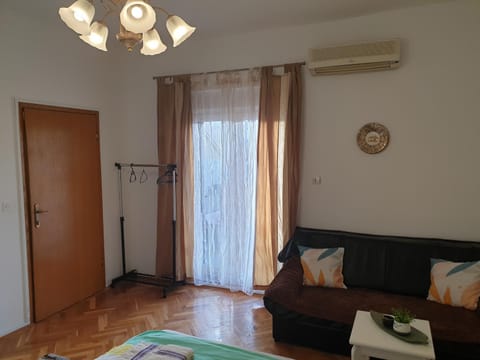Bed, Seating area, Bedroom, wardrobe, air conditioner