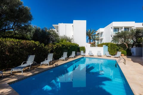 Property building, Living room, Swimming pool