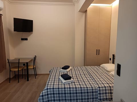 Bed, TV and multimedia, Bedroom, hair dresser, towels, wardrobe, air conditioner