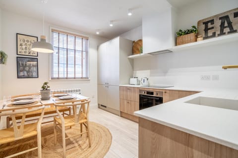 Seating area, oven, stove, kitchen