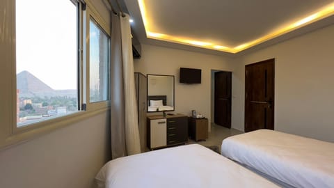 Bed, Natural landscape, TV and multimedia, View (from property/room), Photo of the whole room, Bedroom, Landmark view, Mountain view, hair dresser