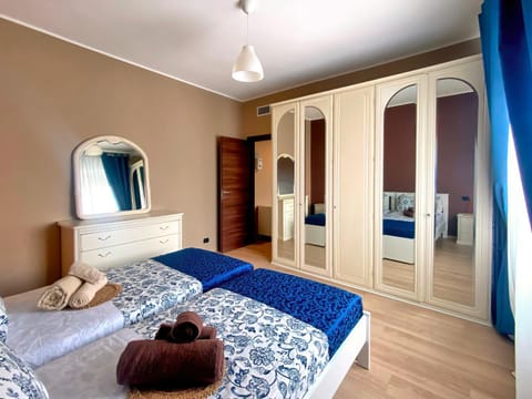 Bed, Photo of the whole room, Bedroom, towels, wardrobe