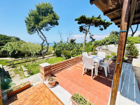Property building, Natural landscape, Garden, View (from property/room), Balcony/Terrace, Dining area