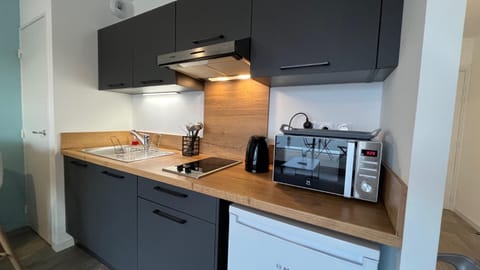 Kitchen or kitchenette, microwave, stove, kitchen, kitchen