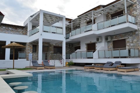 Property building, Patio, Day, Balcony/Terrace, Pool view, Swimming pool