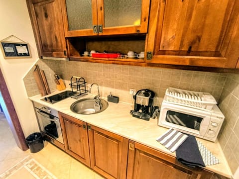 Kitchen or kitchenette, stove, toaster