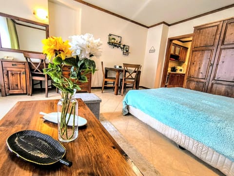 Bed, Living room, Seating area, Dining area, Bedroom