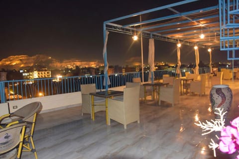 Restaurant/places to eat, Night, View (from property/room), Balcony/Terrace, Seating area
