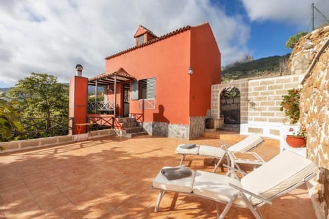 Property building, Natural landscape, Seating area, Mountain view, sunbed