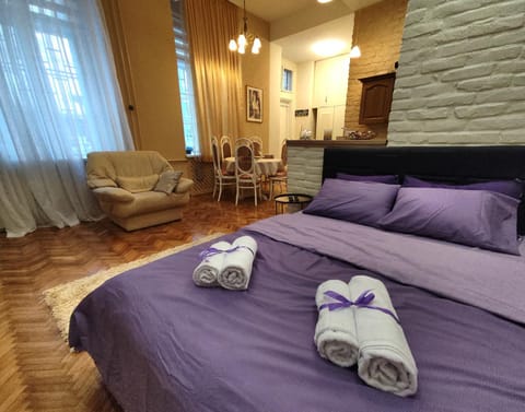 Bed, Living room, Seating area, Bedroom, towels