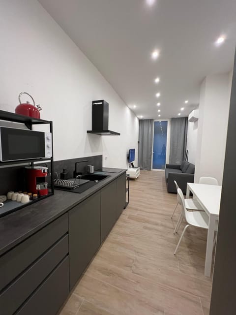 Photo of the whole room, Dining area, stove, kitchen