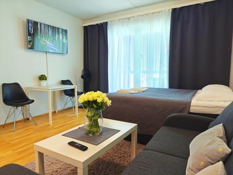 Bed, TV and multimedia, Living room, Photo of the whole room, Seating area