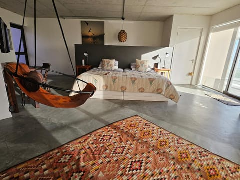 Bed, Seating area, Bedroom