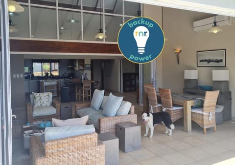 Property logo or sign, Seating area, Swimming pool