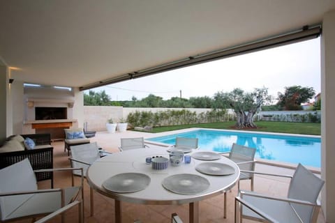 Patio, Balcony/Terrace, Seating area, Pool view