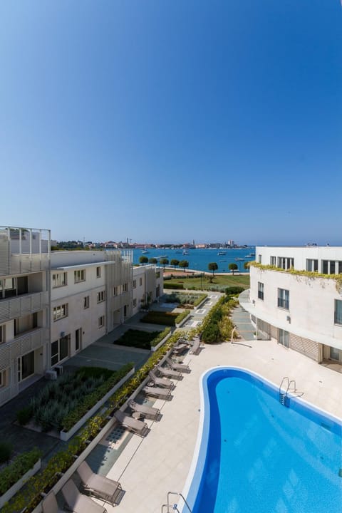 Property building, Day, Natural landscape, Pool view, Sea view, Swimming pool