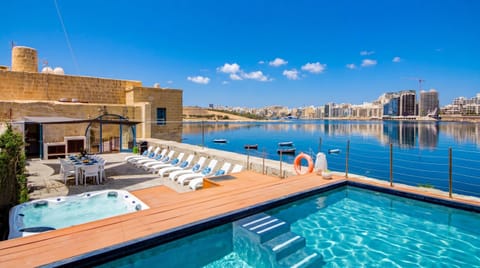 Property building, Patio, Nearby landmark, Day, Natural landscape, Lake view, Pool view, River view, Swimming pool, sunbed