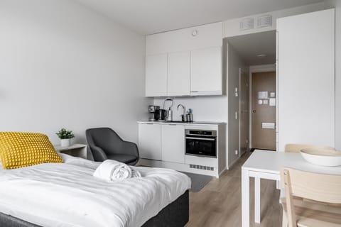 Kitchen or kitchenette, Living room, Photo of the whole room, Seating area, Dining area, Bedroom, oven