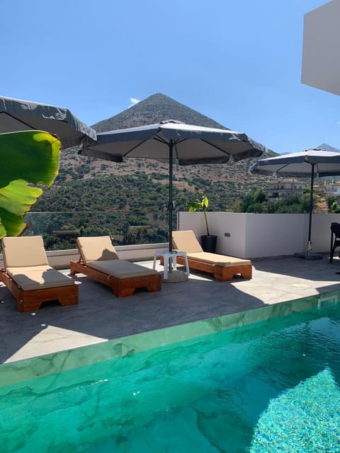 Patio, Day, Natural landscape, Seating area, Mountain view, Pool view, Swimming pool, sunbed