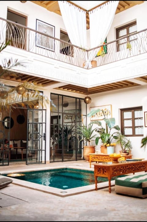 Property building, Patio, Day, Pool view, Swimming pool