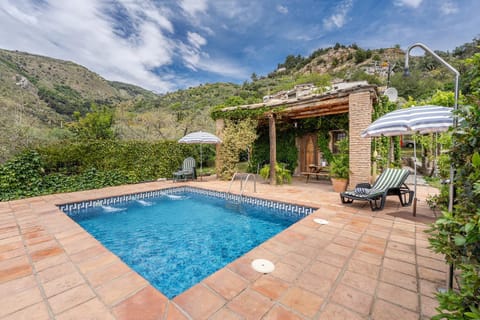 Property building, Living room, Swimming pool
