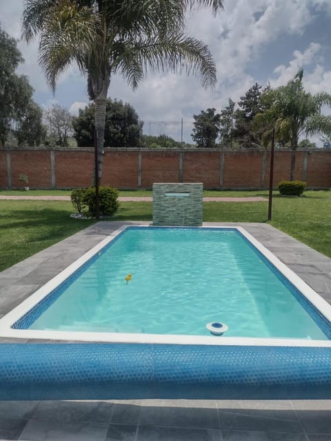 Casa de descanso alberca climatizada House in Atlixco