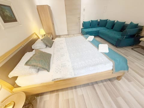 Bed, Seating area, Bedroom