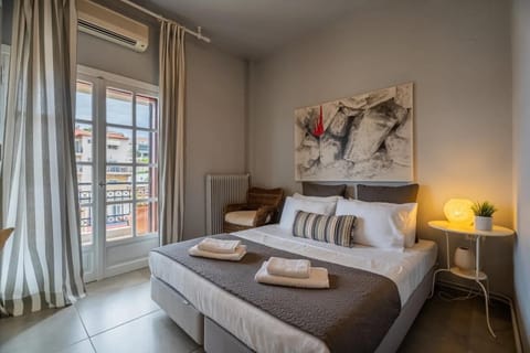 Bed, Photo of the whole room, Bedroom, towels, air conditioner