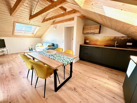 Kitchen or kitchenette, Living room, Seating area, Dining area