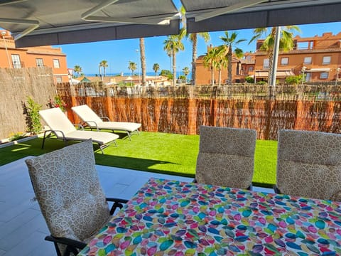 Patio, Spring, Day, Garden, View (from property/room), Balcony/Terrace, Balcony/Terrace, Living room, Seating area, Beach, Garden view, Sea view, sunbed