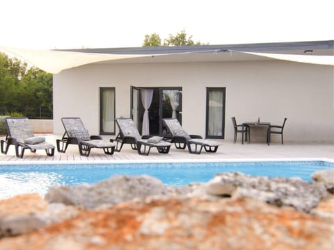 Property building, Swimming pool, sunbed