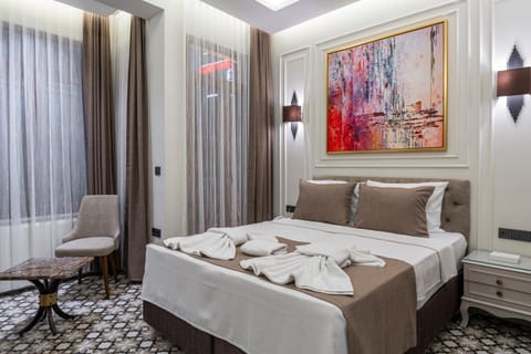 Bed, Seating area, Bedroom, towels