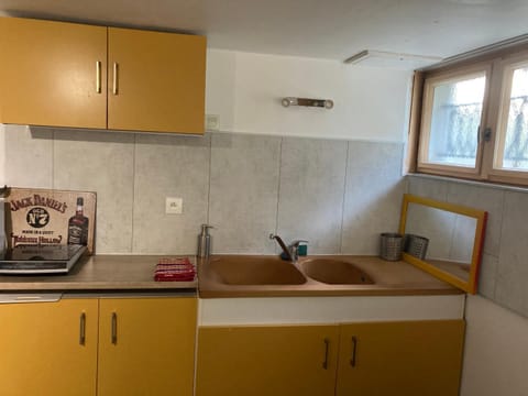Kitchen or kitchenette, stove