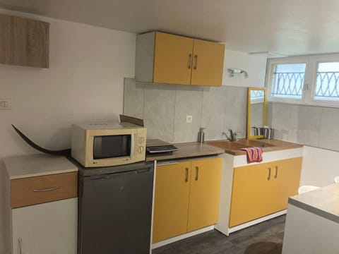 Kitchen or kitchenette, stove