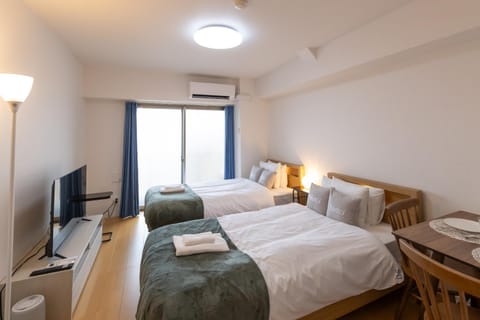 Bed, Photo of the whole room, Bedroom, towels, air conditioner