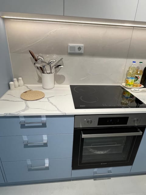 Kitchen or kitchenette, oven