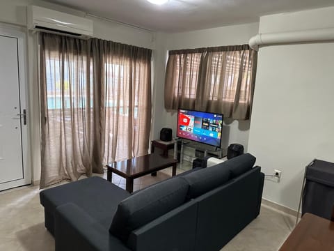 TV and multimedia, Living room, Seating area, air conditioner