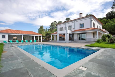 Property building, Living room, Swimming pool