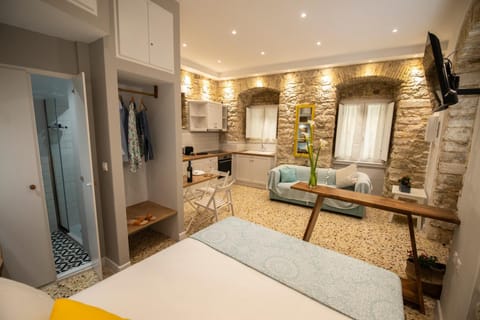 Bed, Seating area, wardrobe