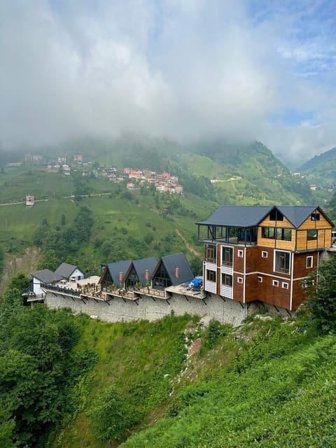 Property building, Restaurant/places to eat, Natural landscape, Mountain view