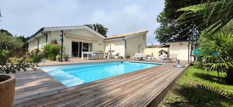 Property building, Patio, Day, Natural landscape, Garden, Garden view, Pool view, Swimming pool, sunbed