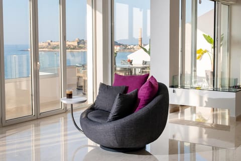 Natural landscape, View (from property/room), Living room, Seating area, Sea view