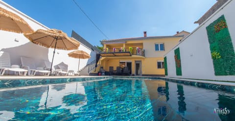 Property building, Pool view, Swimming pool, sunbed