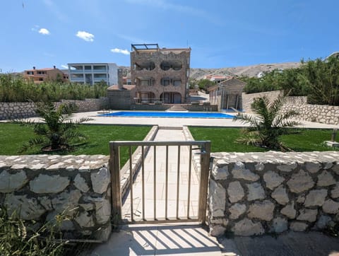 Property building, Day, Natural landscape, Pool view, Swimming pool