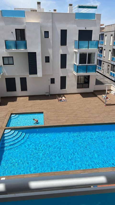 Property building, View (from property/room), Balcony/Terrace, Pool view, Swimming pool, sunbed
