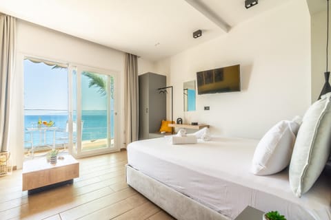 Bed, Living room, Seating area, Sea view