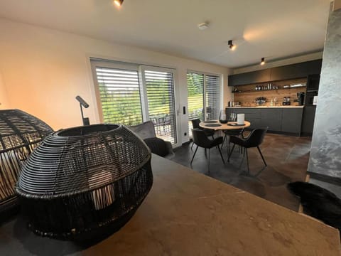 Kitchen or kitchenette, Living room, Seating area, Dining area